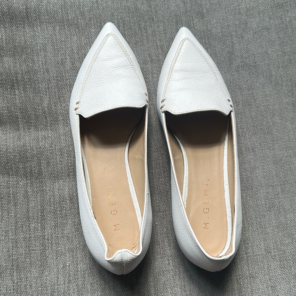 Never worn, soled, flat leather white shoes